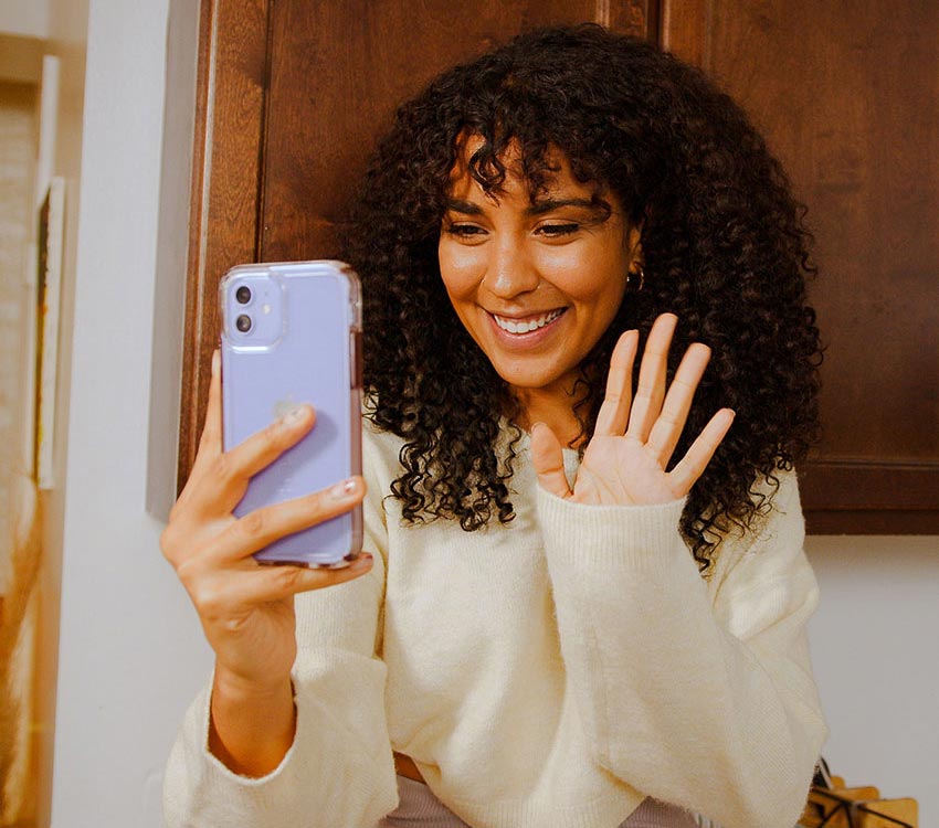 Young woman receiving mental health treatment on her phone